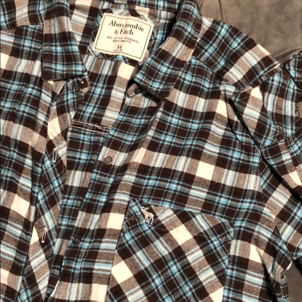brown and blue flannel